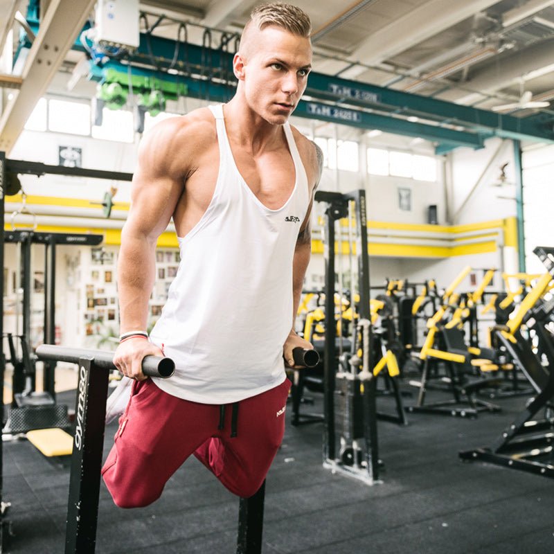 Mutaria Performance Stringer White