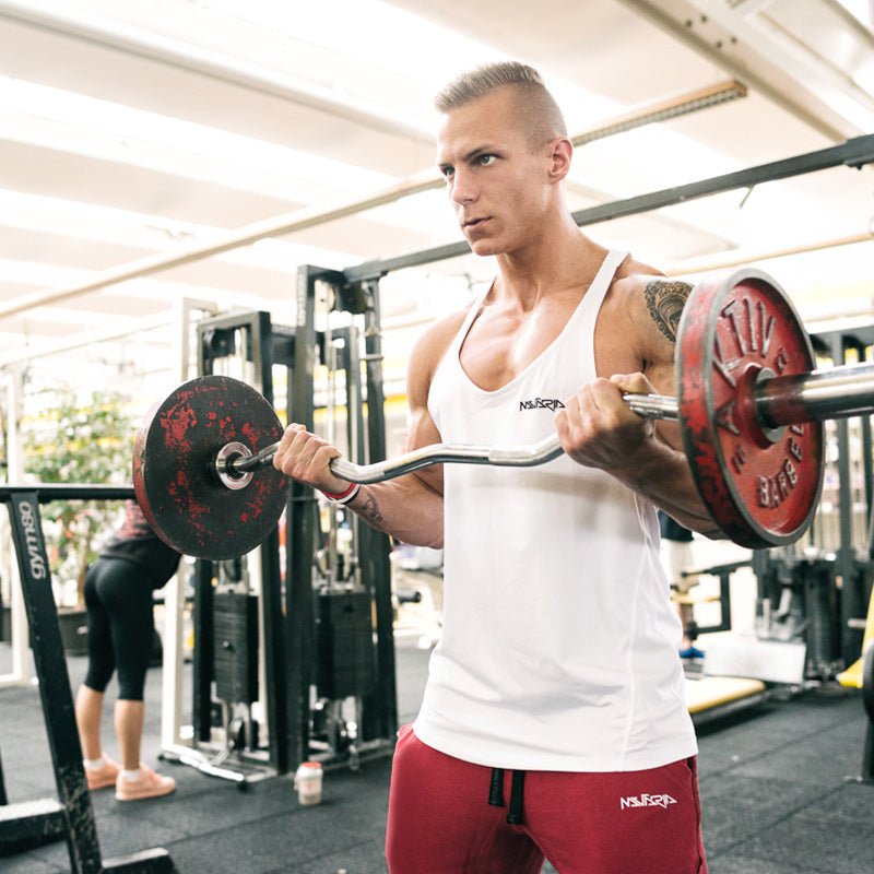 Mutaria Performance Stringer White